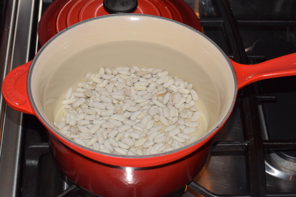cannellini beans soaking in pot
